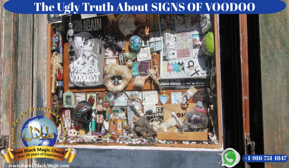 Signs of voodoo, window display with voodoo and black magic items.